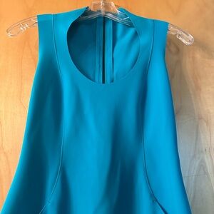 New without tags Maria Pinto size xs turquoise dress with back zipper.